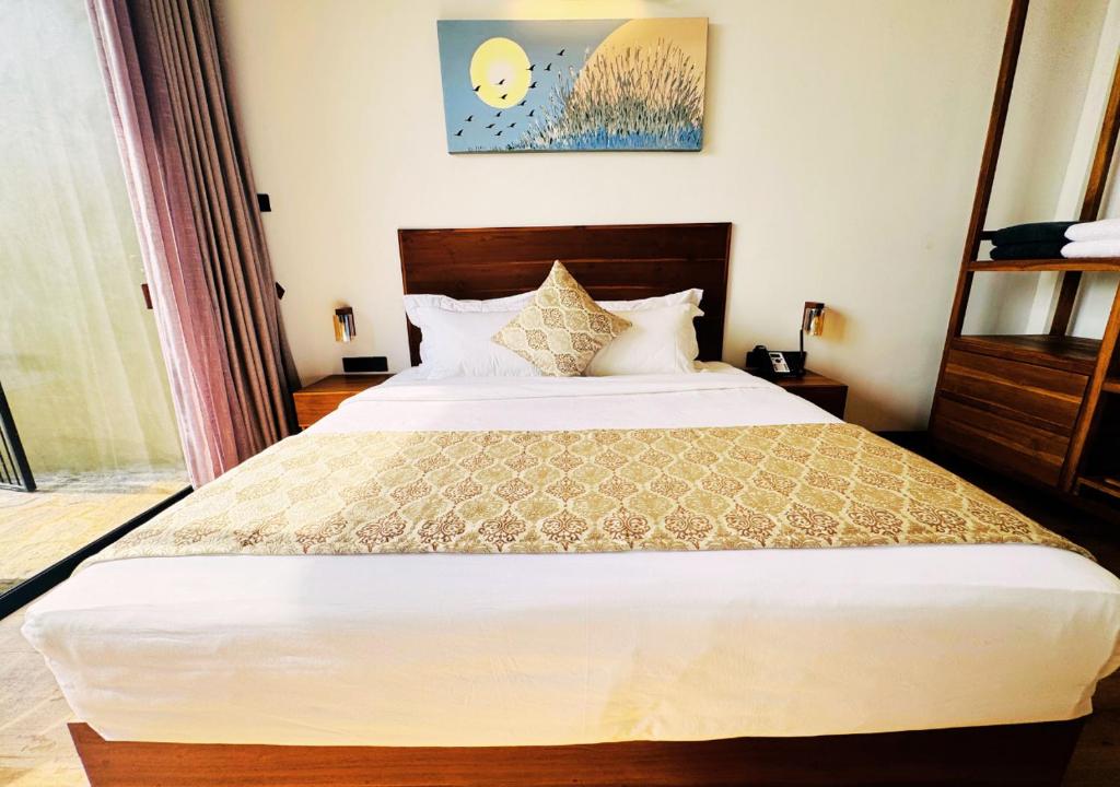 Postel nebo postele na pokoji v ubytování Diyakawa Boutique Hotel