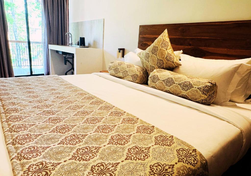 Postel nebo postele na pokoji v ubytování Diyakawa Boutique Hotel