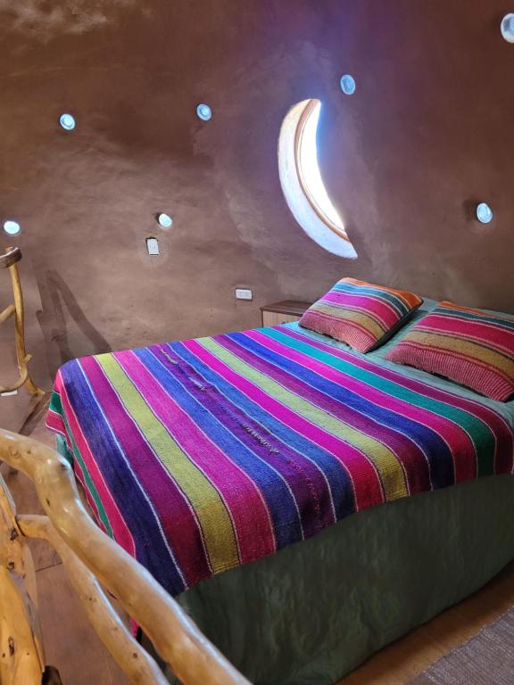 Postel nebo postele na pokoji v ubytování Cupula Sagrada