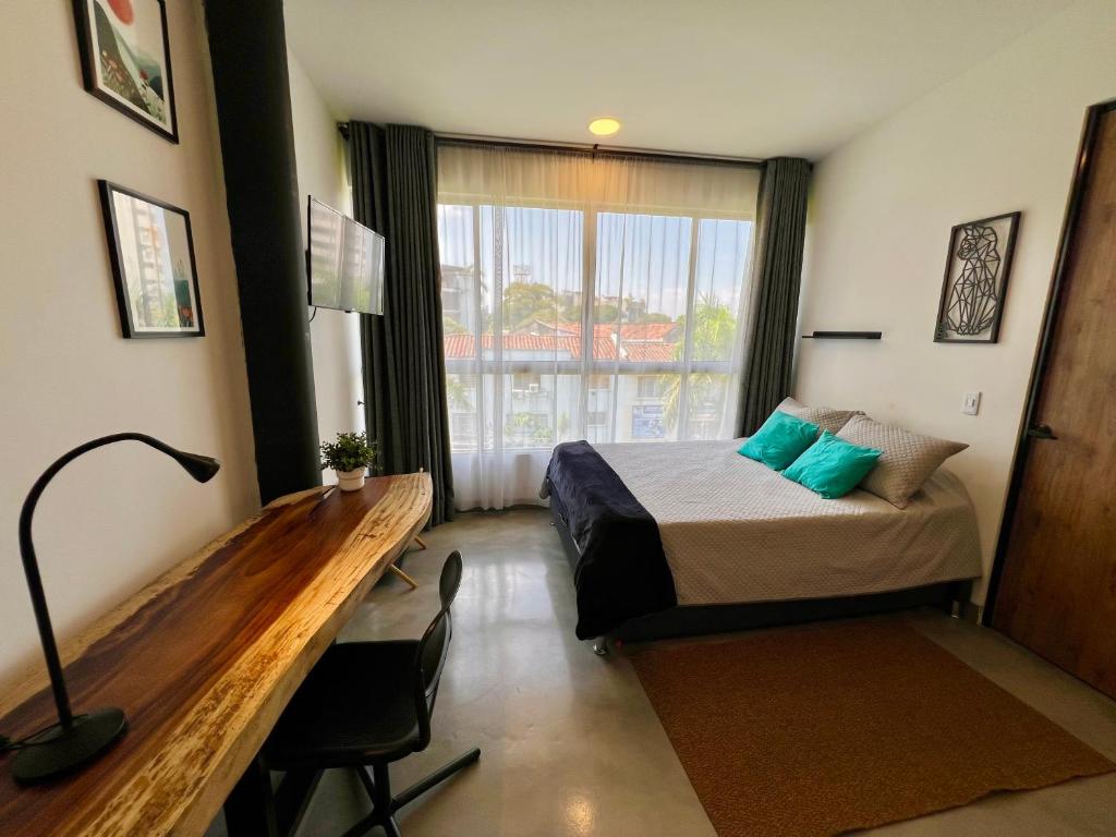 Postel nebo postele na pokoji v ubytování Baum Loft San Fernando 402