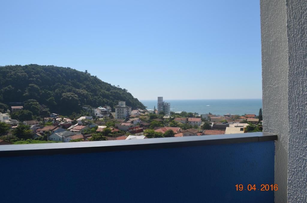 a view of a city from a building at Residencial Lunata in Penha