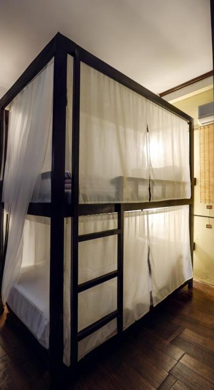 Postel nebo postele na pokoji v ubytování Non Pakse Hostel