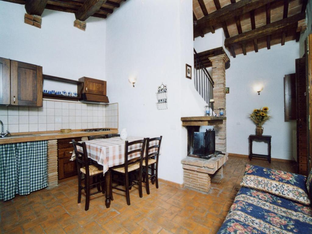 A kitchen or kitchenette at Farmhouse in Proceno with Pool and Terrace