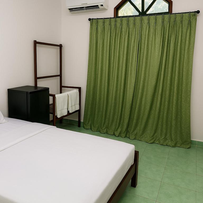 Postel nebo postele na pokoji v ubytování Hostel Colombo Airport