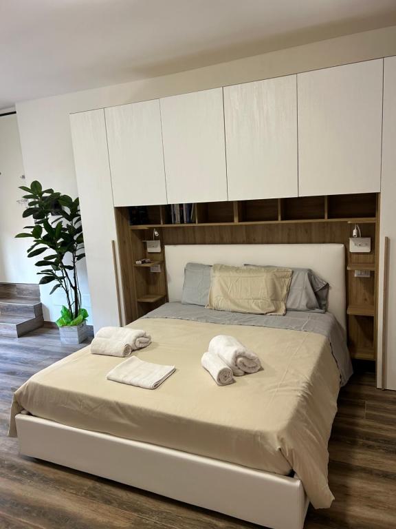 Postel nebo postele na pokoji v ubytování Caprotti 6