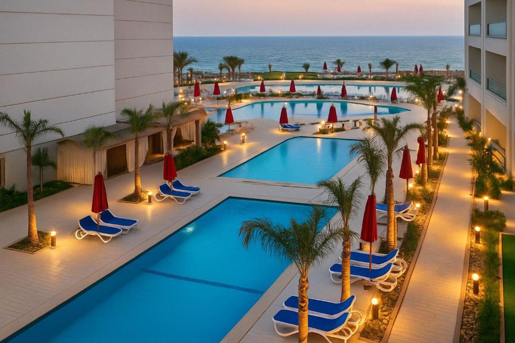 The swimming pool at or close to Porto Said Resort Rentals