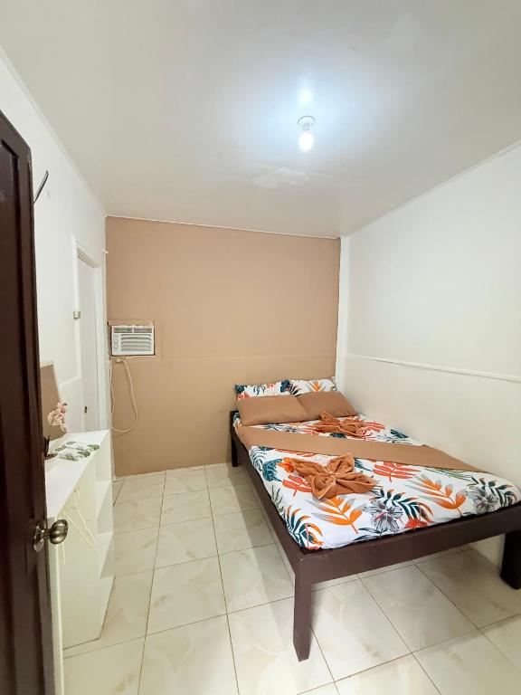 Postel nebo postele na pokoji v ubytování Paradiso Hostel El nido