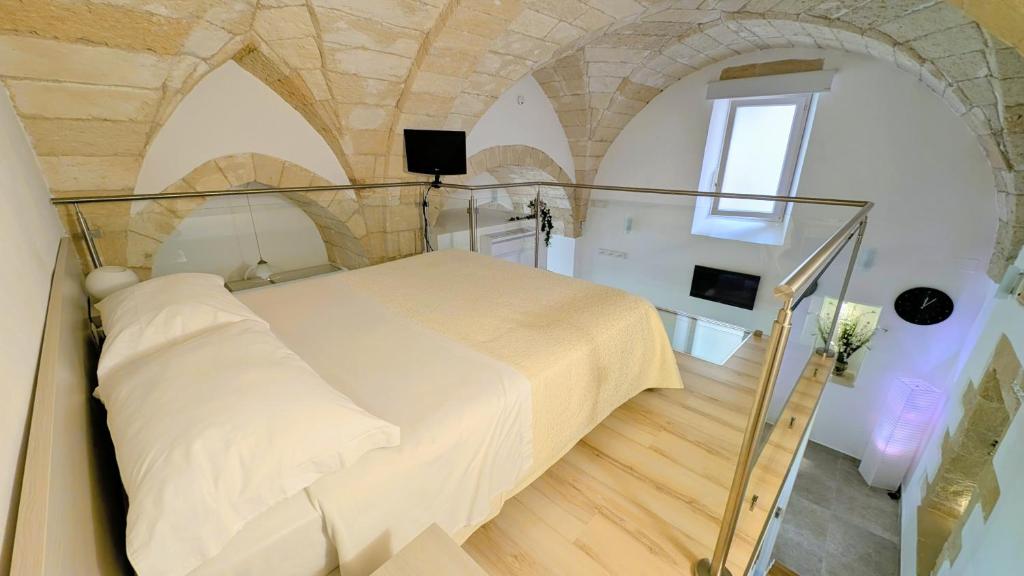 Postel nebo postele na pokoji v ubytování B&B Corte Regina Esther