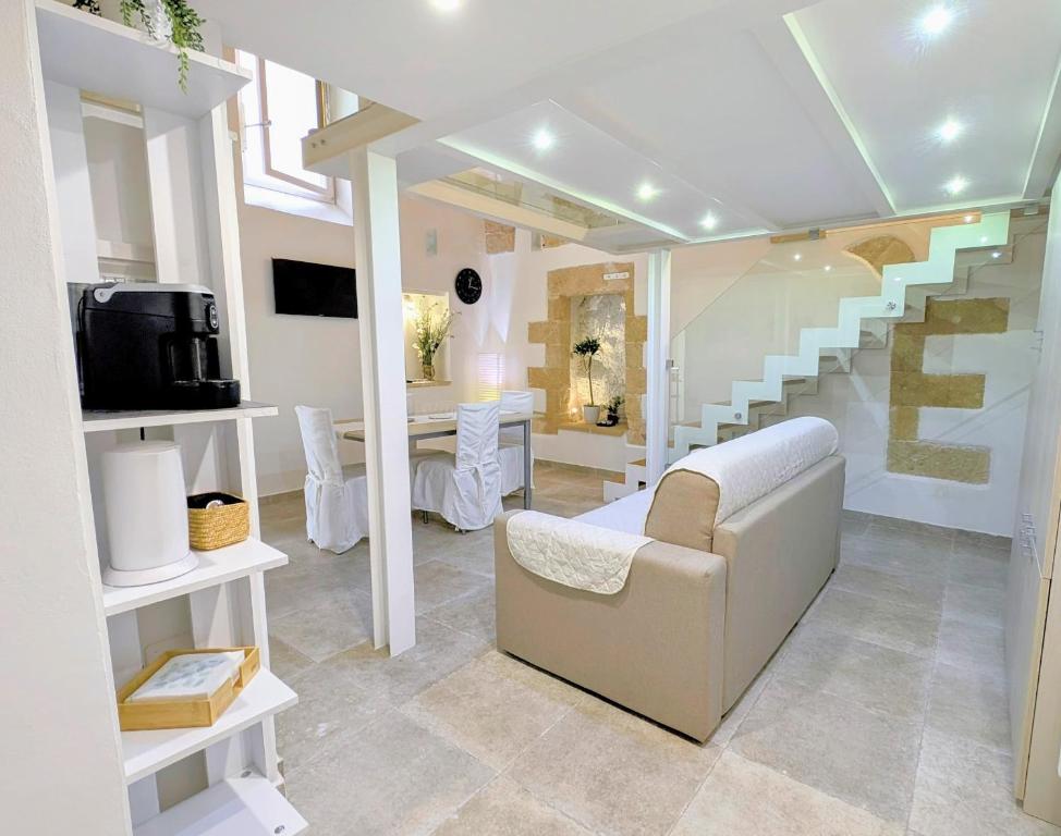 TV a/nebo společenská místnost v ubytování B&B Corte Regina Esther