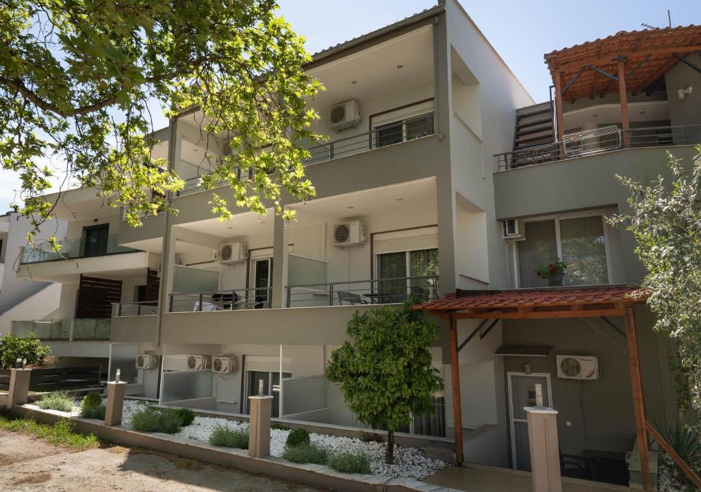 an image of an apartment building at Kipos Resort in Nea Peramos
