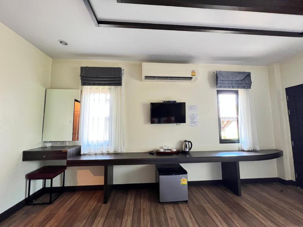 Kuchyň nebo kuchyňský kout v ubytování Palm Kiri Aonang Resort