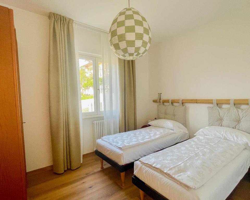 Postel nebo postele na pokoji v ubytování HomeTerra