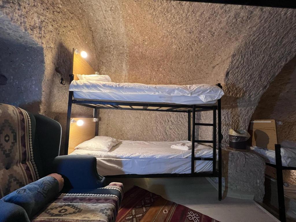 Postel nebo postele na pokoji v ubytování Center cave hostel