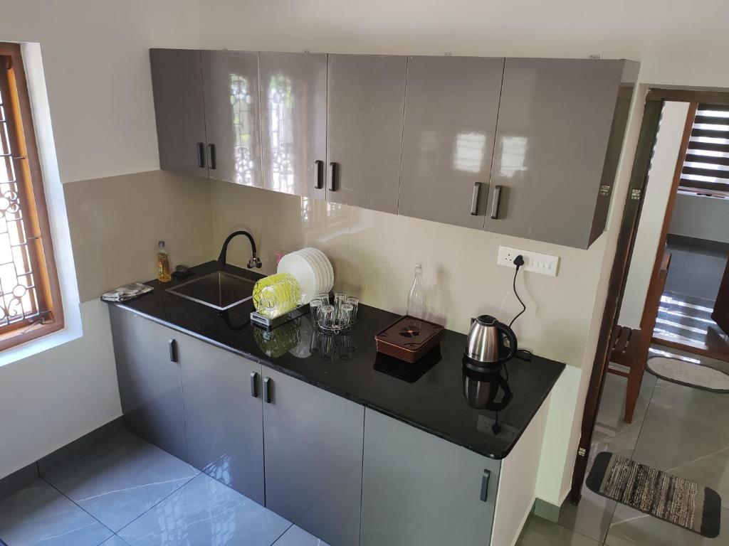 Kuchyň nebo kuchyňský kout v ubytování Sapphire Haven