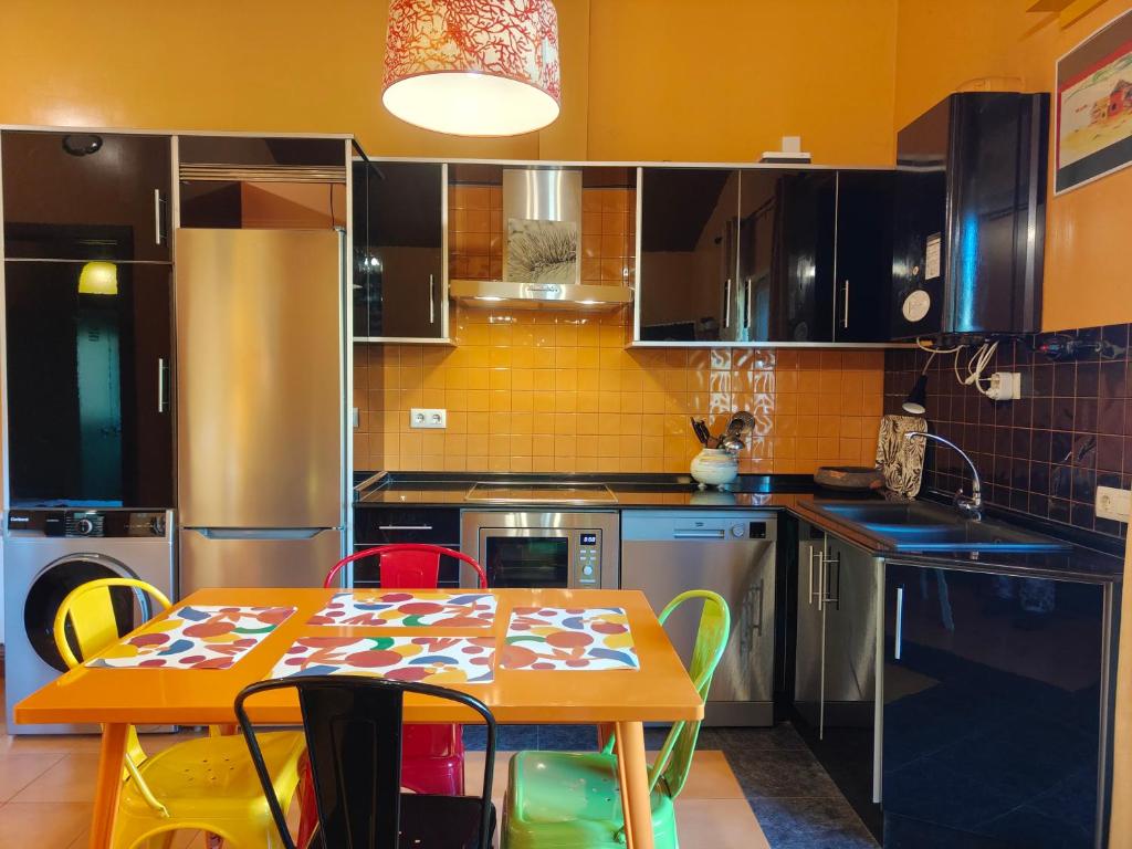 Kuchyň nebo kuchyňský kout v ubytování Apartamentos Rosa Jove