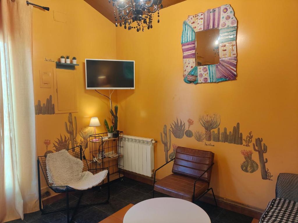 TV a/nebo společenská místnost v ubytování Apartamentos Rosa Jove