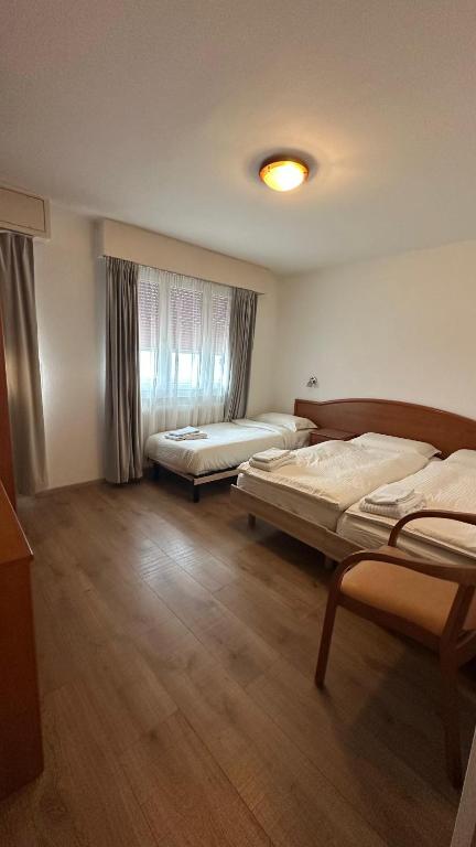 Postel nebo postele na pokoji v ubytování Hotel Du Quai