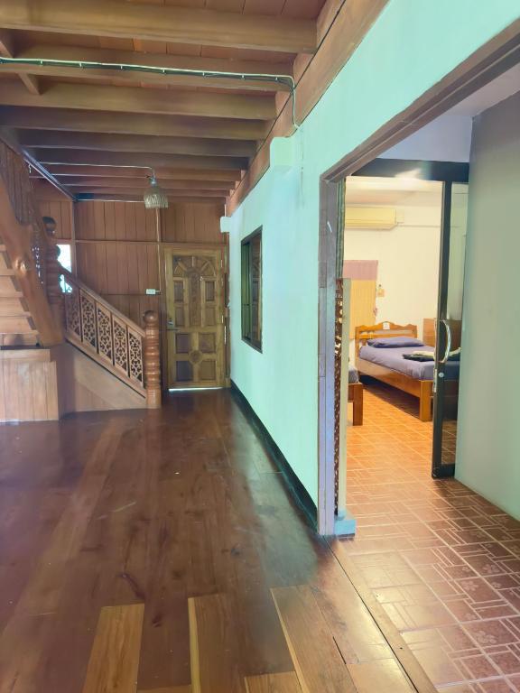 Postel nebo postele na pokoji v ubytování Shaya Homestay & Dorms