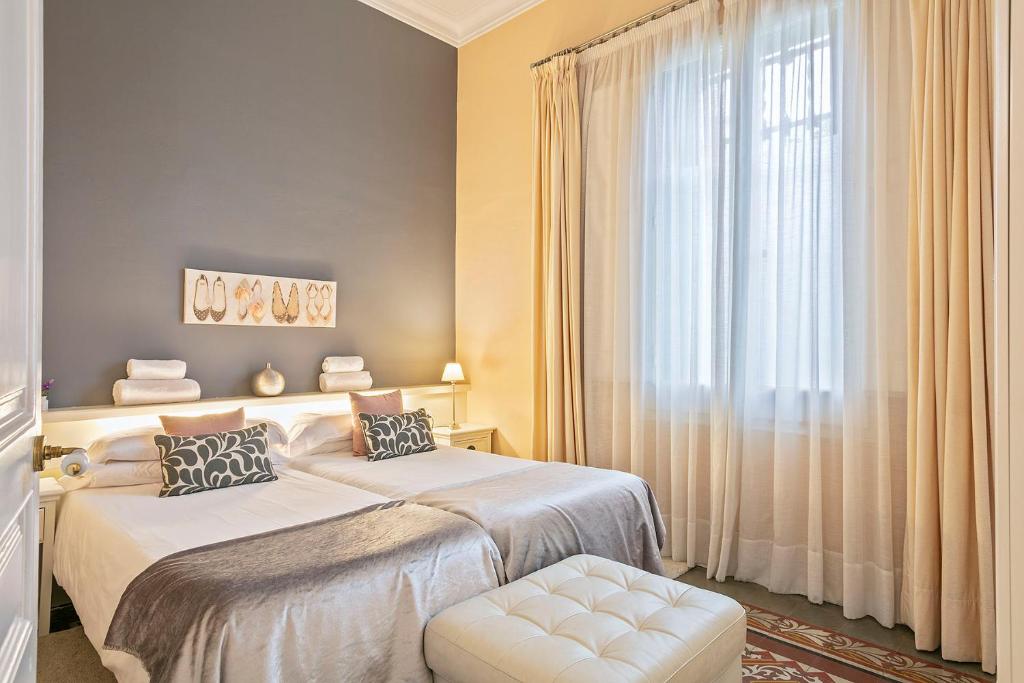 Postel nebo postele na pokoji v ubytování Villa Modernista