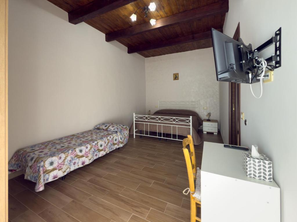 Postel nebo postele na pokoji v ubytování B&B Vatra