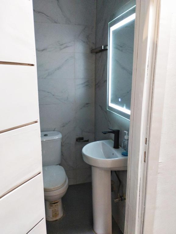 Koupelna v ubytování Cosse Apartment