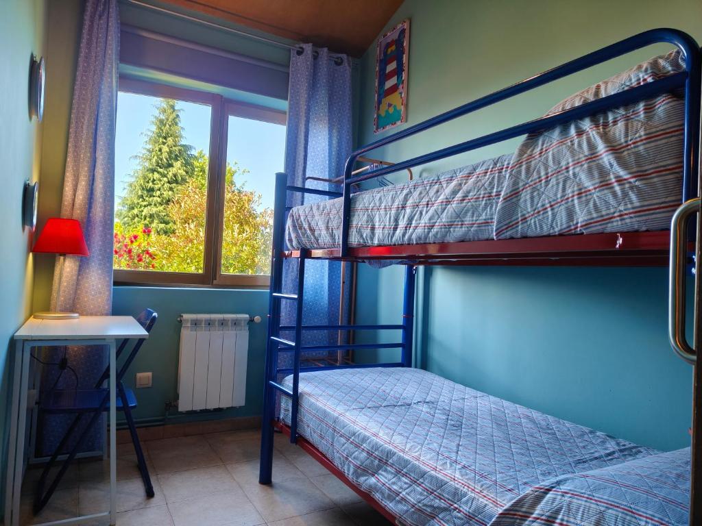 Postel nebo postele na pokoji v ubytování Apartamentos Rosa Jove