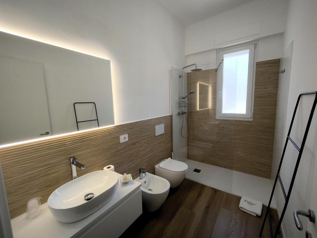 Koupelna v ubytování Faber Home