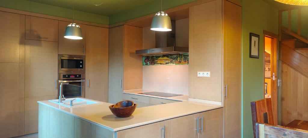 Kuchyň nebo kuchyňský kout v ubytování Apartamentos Rosa Jove