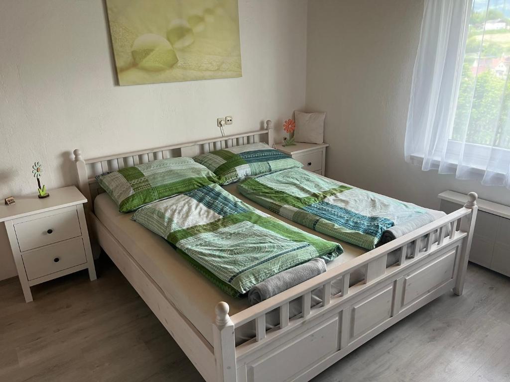 Postel nebo postele na pokoji v ubytování Alpenblick Trofaiach