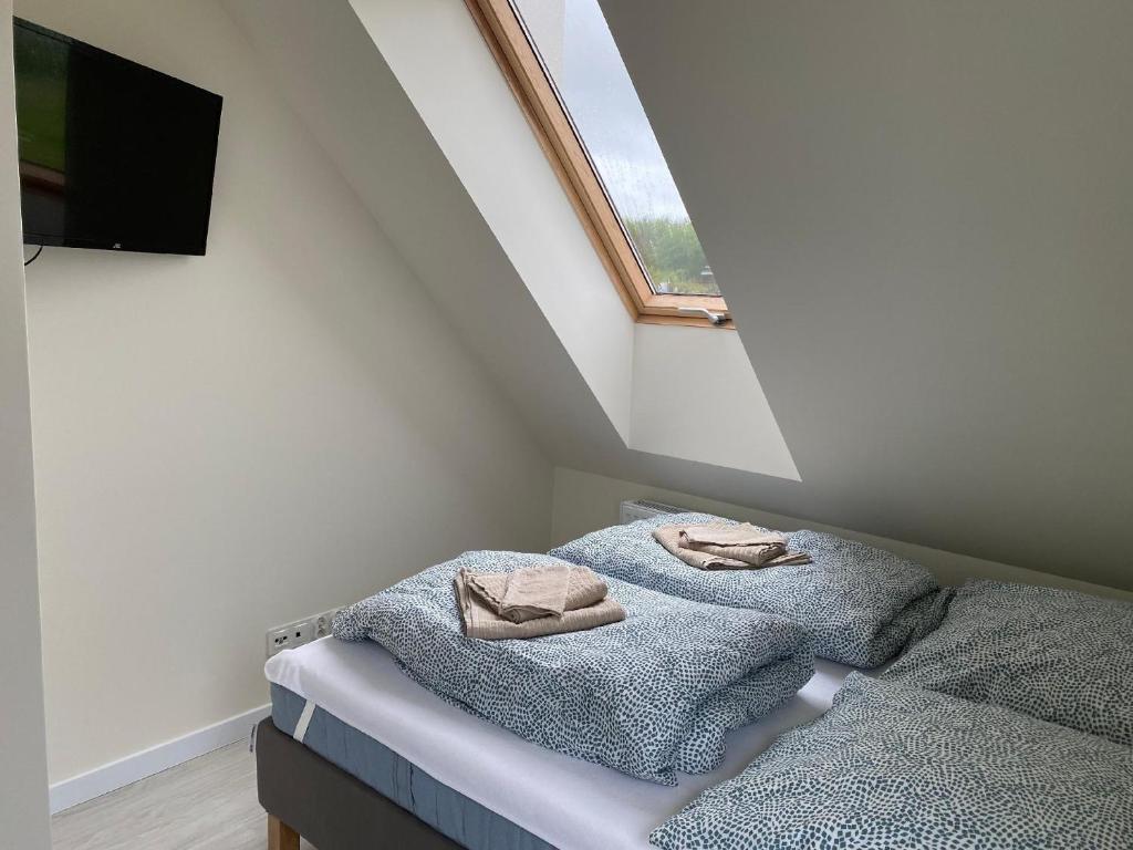 Fotografia z galérie ubytovania Ferienhaus in Trzsacz an der Ostsee Mit eigener Sauna und Kamin v destinácii Trzęsacz
