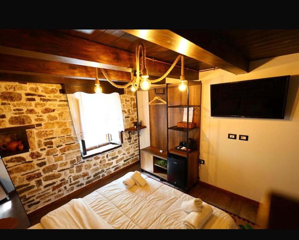 Postel nebo postele na pokoji v ubytování Ador Boutique Hotel