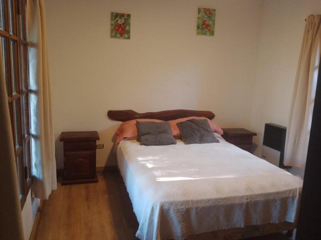 Postel nebo postele na pokoji v ubytování Casa del Bosque