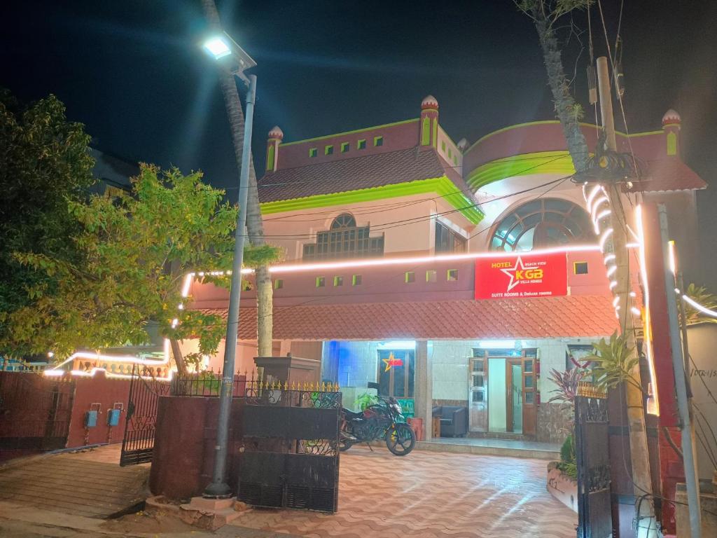 a building at night with a street light in front at Kgb villa homes in Visakhapatnam