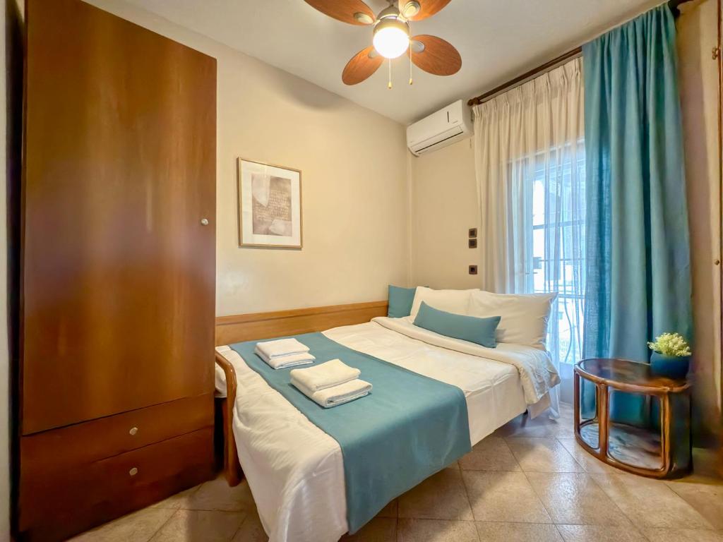 Postel nebo postele na pokoji v ubytování Stavros & Maria's Haus