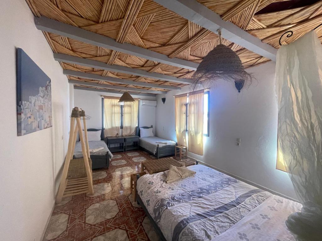Postel nebo postele na pokoji v ubytování Etoile d Or Ksar Ait Ben Haddou