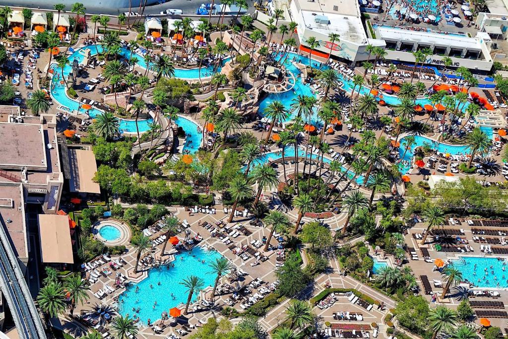 an aerial view of a water park at a resort at MGM Signature - NO FEEs, Free Valet, Lazy river View in Las Vegas