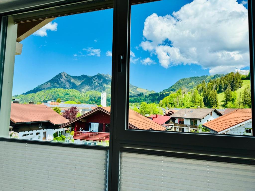 a view from a window of a town at Berg Fux - Ferienwohnung Alfred der Büffel in Sonthofen
