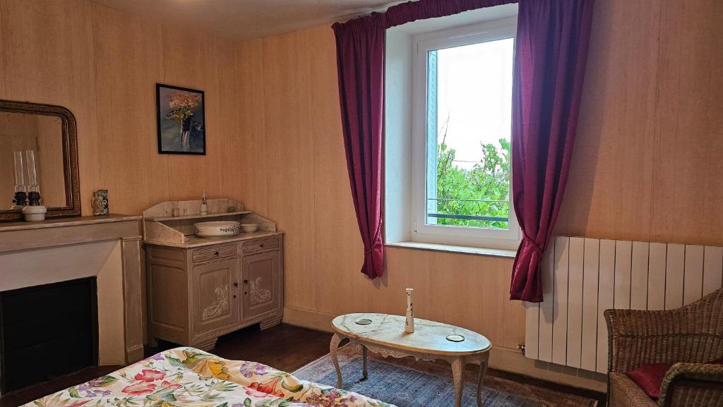 Posteľ alebo postele v izbe v ubytovaní Maison familiale Ronchonnette et mon Repos