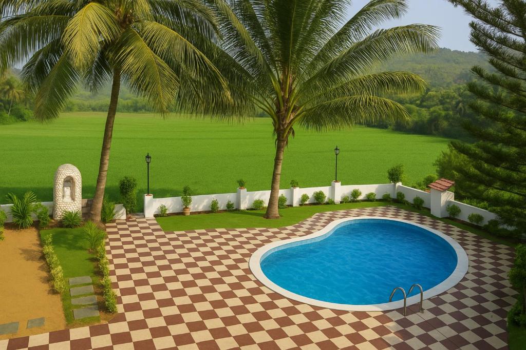 Bazén v ubytování Casa Da Village Calangute Goa nebo v jeho okolí