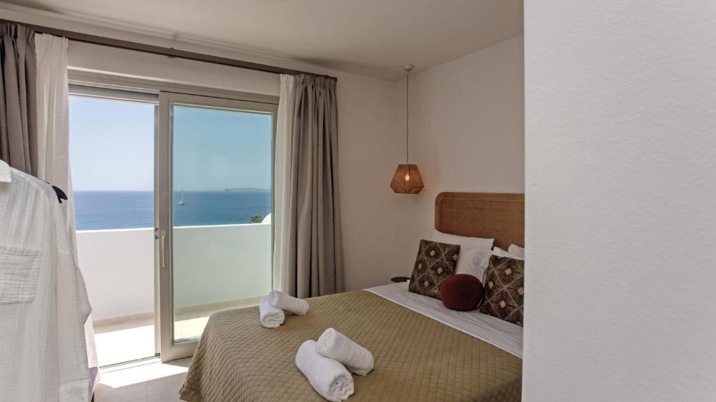 A bed or beds in a room at Only yours , Mykonos