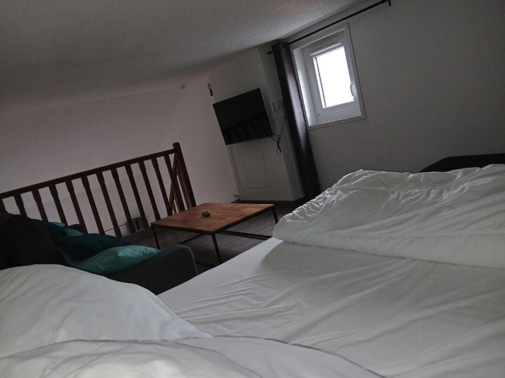 Postel nebo postele na pokoji v ubytování Appartement chaleureux.