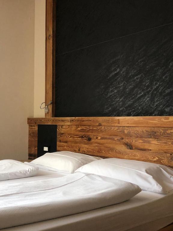 Postel nebo postele na pokoji v ubytování Park Hotel Avisio