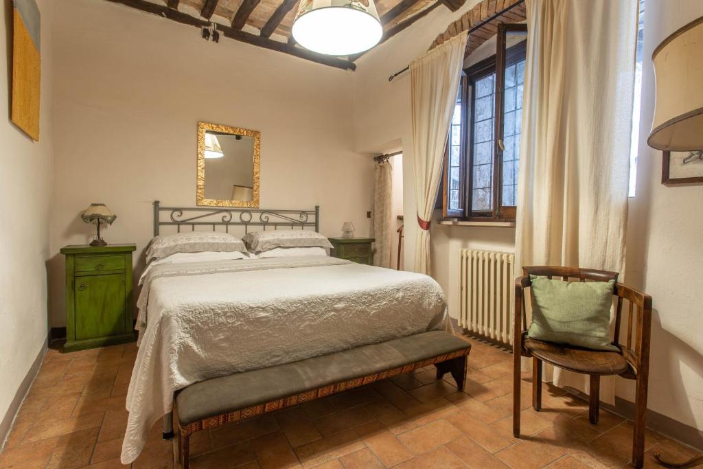 Postel nebo postele na pokoji v ubytování Guesthouse da Idolina dal 1946