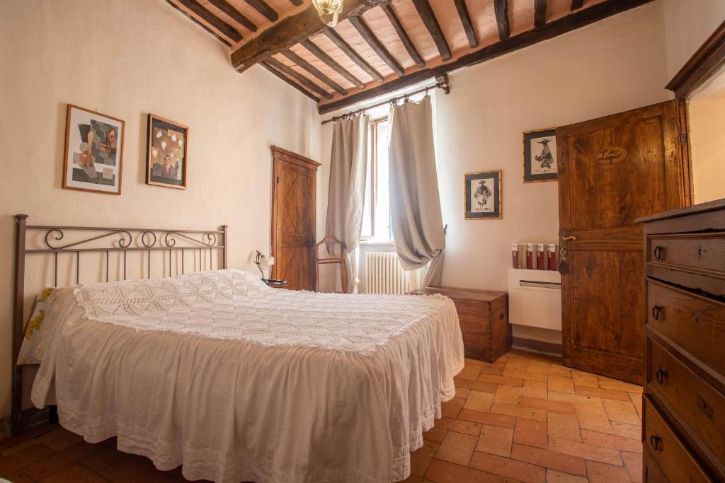 Postel nebo postele na pokoji v ubytování Guesthouse da Idolina dal 1946
