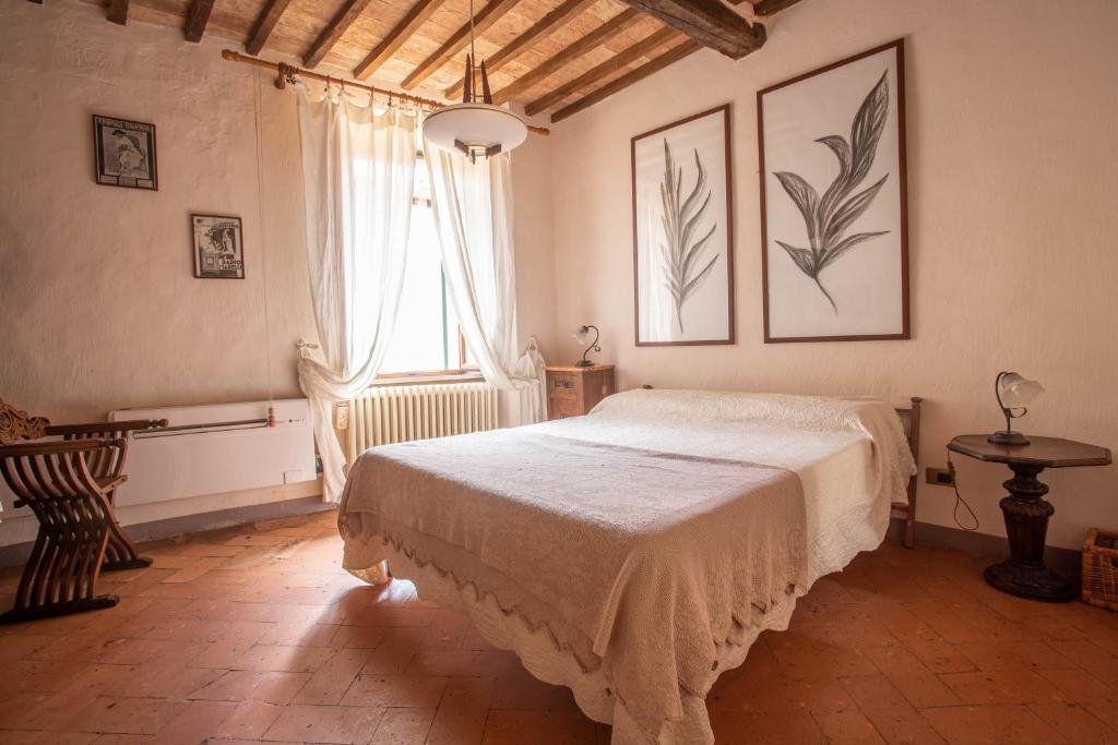 Postel nebo postele na pokoji v ubytování Guesthouse da Idolina dal 1946