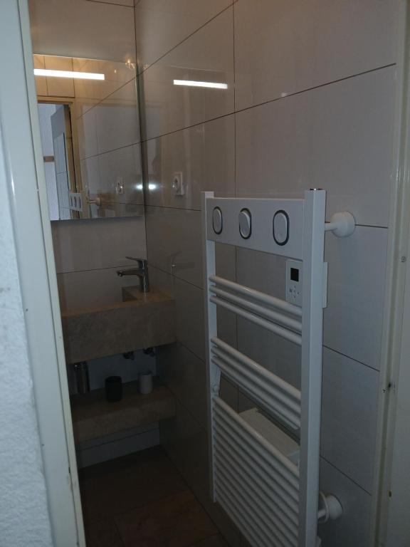 Koupelna v ubytování Appartement chaleureux.