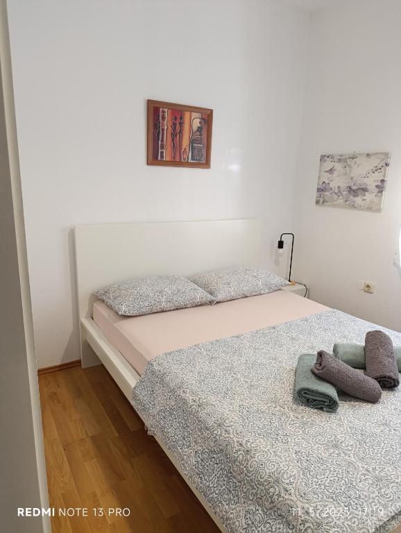 Posteľ alebo postele v izbe v ubytovaní Apartment M & M