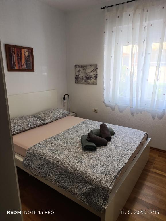 Posteľ alebo postele v izbe v ubytovaní Apartment M & M