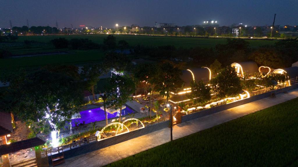 a view of a park at night with lights at TamCoc Moon An Bungalow & Cafe in Ninh Binh
