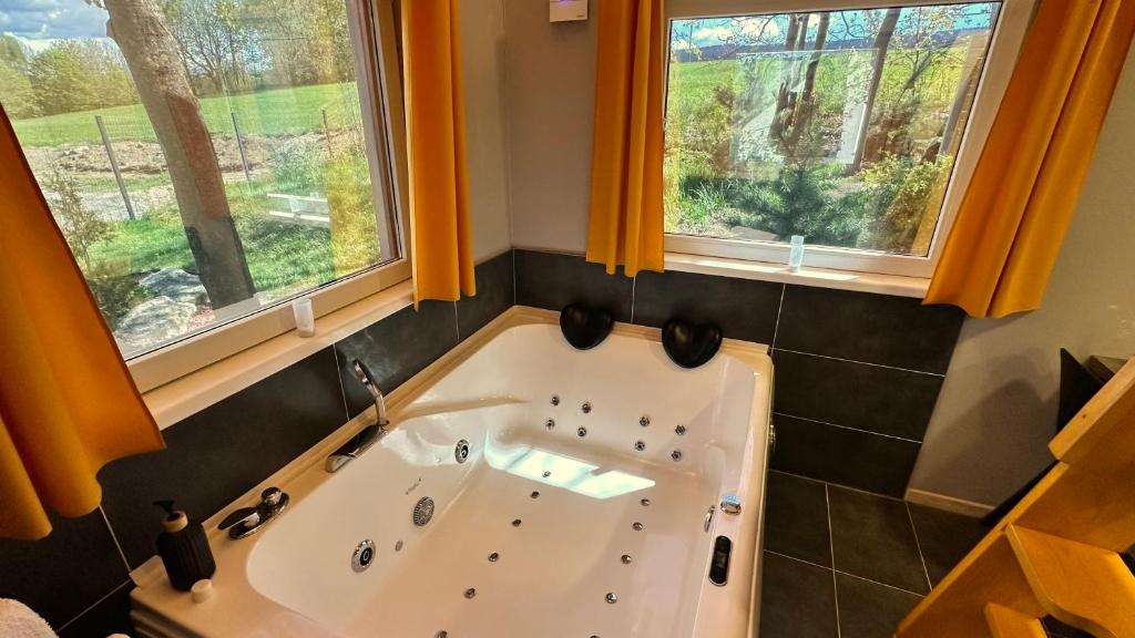 Postel nebo postele na pokoji v ubytování Privátní wellness domek RockStar